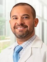 Dr. Carlos Gomez Meade