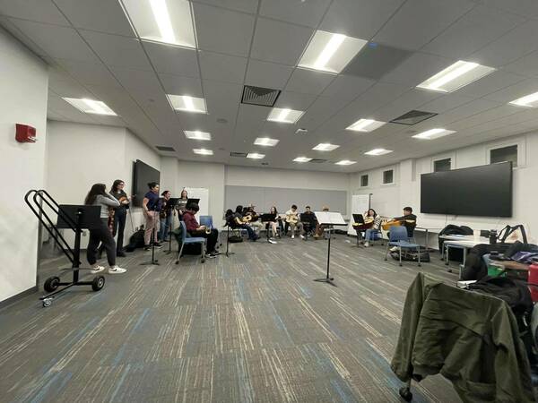 Spring 2024 Mariachi students practicing during class.